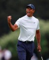 Tiger Woods reacts to his birdie putt on 15 during the second round of the Masters golf tournament Friday, April 12, 2019, at Augusta National Golf Club in Augusta, Ga. (Curtis ComptonAtlanta Journal-Constitution via AP)