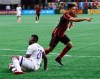 Atlanta United midfielder Pity Martinez, right, reacts to scoring a goal past Orlando City defender Kamal Miller for a 1-0 lead in a MLS soccer match on Sunday, May 12, 2019, in Atlanta. (Curtis Compton/Atlanta Journal-Constitution via AP)