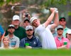 Justin Rose hits his tee shot on the fourth hole during a practice round for the Masters golf tournament in Augusta, Ga., Monday, April 8, 2019. (Curtis Compton/Atlanta Journal-Constitution via AP)