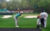 Rory Mcllroy looks on as Dustin Johnson tees off on the fourth hole during a practice round for the Masters golf tournament at Augusta National Golf Club in Augusta, Ga., Monday, April 8, 2019. (Curtis Compton/Atlanta Journal-Constitution via AP)