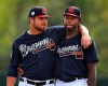 Atlanta Braves pitchers Bryse Wilson, left, and Touki Toussaint share a hug during the first full squad workout at baseball spring training in Kissimmee, Fla., Thursday, Feb. 21, 2019. (Curtis Compton/Atlanta Journal-Constitution via AP)