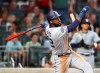 San Diego Padres Franmil Reyes hits a home run during the sixth inning of a baseball game against the Atlanta Braves, Tuesday, April 30, 2019 in Atlanta. (Curtis Compton/Atlanta Journal-Constitution via AP)