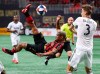 Atlanta United forward Josef Martinez makes a bicycle kick next to Philadelphia Union defender Jack Elliott that was blocked by goalkeeper Andre Blake during the second half of an MLS soccer match that ended in a 1-1 draw, Sunday, March 17, 2019, in Atlanta. (Curtis Compton/Atlanta Journal-Constitution via AP)