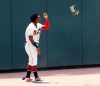 Atlanta Braves outfielder Ronald Acuna Jr. tosses his glove after losing a three-run home run by Los Angeles Dodgers' Cody Bellinger during the first inning of a baseball game Sunday, Aug. 18, 2019, in Atlanta. (Curtis Compton/Atlanta Journal-Constitution via AP)