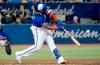 Toronto Blue Jays third baseman Vladimir Guerrero Jr. (27) hits a three-run home run during ninth inning American League MLB baseball action against the Toronto Blue Jays, in Toronto on Saturday, July 27, 2019. THE CANADIAN PRESS/Nathan Denette