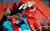 Toronto FC defender Gregory van der Wiel (9) fails to make the header as Club Atletico Independiente goalkeeper Jose Guerra (12) punches the ball away during second half Concacaf Champions League soccer action in Toronto on Tuesday, February 26, 2019. THE CANADIAN PRESS/Nathan Denette