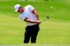 Brooks Koepka chips to the fourth green during the first round of the Tour Championship golf tournament Friday, Aug. 23, 2019, in Atlanta. (AP Photo/John Amis)