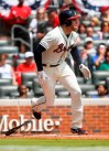 Atlanta Braves' Freddie Freeman watches his home run ball fly to center field during the first inning of a baseball game against the Miami Marlins, Sunday, April 7, 2019, in Atlanta. (AP Photo/John Amis)