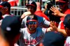 Washington Nationals' Adam Eaton is congratulated in the dugout followed by Trea Turner after hitting a two-run home run during the first inning of a baseball game against the Atlanta Braves, Sunday, Sept. 8, 2019, in Atlanta. (AP Photo/John Amis)
