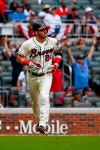 Atlanta Braves' Josh Donaldson watches his two-run home run ball sail over right field during the third inning of a baseball game Sunday, July 7, 2019, in Atlanta. (AP Photo/John Amis)