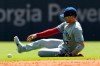 Toronto Blue Jays second baseman Cavan Biggio recovers a a fielding error by third baseman Brandon Drury on a ball hit by Atlanta Braves' Dansby Swanson during the third inning of a baseball game Monday, Sept. 2, 2019, in Atlanta. Josh Donaldson and Ozzie Albies scored on the play. (AP Photo/John Amis)