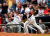 Atlanta Braves' Josh Donaldson rounds first base during his home run against the Pittsburgh Pirates in the second inning of a baseball game Tuesday June 11, 2019, in Atlanta. (AP Photo/John Amis)