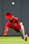 Washington Nationals center fielder Victor Robles makes a diving catch on a ball off the bat of Atlanta Braves' Dansby Swanson during the fifth inning of a baseball game Sunday, July 21, 2019, in Atlanta. (AP Photo/John Amis)