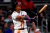 Atlanta Braves' Ronald Acuna Jr. watches his two-run home run ball fly over center field in the fifth inning of a baseball game against the Miami Marlins, Wednesday, Aug. 21, 2019, in Atlanta. (AP Photo/John Amis)