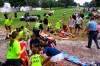 Spectators are tended to after a lightning strike on the East Lake Golf Club course left several injured during a weather delay in the third round of the Tour Championship golf tournament Saturday, Aug. 24, 2019, in Atlanta. (AP Photo/John Amis)