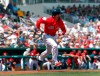 Boston Red Sox' Dustin Pedroia runs to first with a base hit in the first inning of a spring training baseball game against the Detroit Tigers Tuesday, March 12, 2019, in Fort Myers, Fla. (AP Photo/John Bazemore)