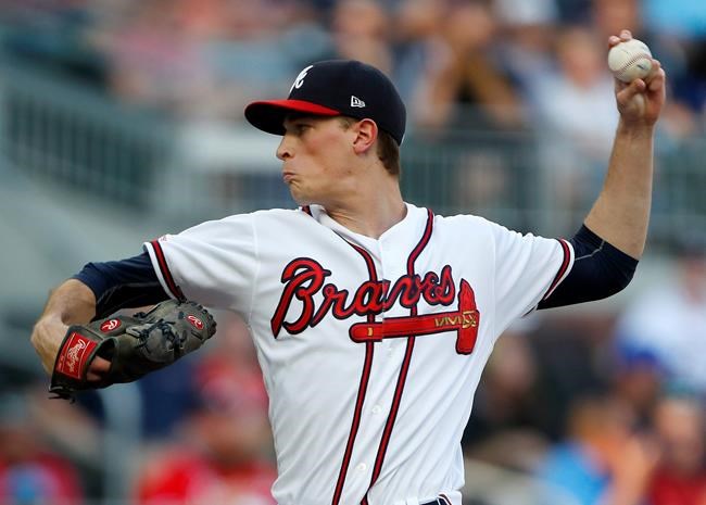 Atlanta Braves starting pitcher Max Fried (54) works in the first inning of a baseball game against the Washington Nationals, Tuesday, May 28, 2019, in Atlanta. (AP Photo/John Bazemore)