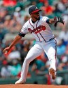 Atlanta Braves starting pitcher Julio Teheran works against the Pittsburgh Pirates in the first inning of a baseball game Thursday, June 13, 2019, in Atlanta. (AP Photo/John Bazemore)