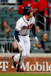 Atlanta Braves first baseman Freddie Freeman (5) runs to first base after connecting on a two-run home run in the first inning of a baseball game against the New York Mets Wednesday, June 19, 2019, in Atlanta. (AP Photo/John Bazemore)