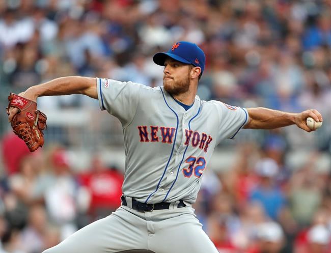 New York Mets starting pitcher Steven Matz (32) delivers in the first inning of a baseball game against the Atlanta Braves Wednesday, June 19, 2019, in Atlanta. (AP Photo/John Bazemore)