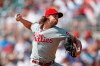 Philadelphia Phillies starting pitcher Aaron Nola (27) delivers in the first inning of a baseball game against the Atlanta Braves Thursday, Sept. 19, 2019, in Atlanta. (AP Photo/John Bazemore)