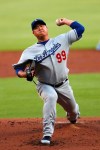 Los Angeles Dodgers starting pitcher Hyun-Jin Ryu throws in the first inning of a baseball game against the Atlanta Braves, Saturday, Aug. 17, 2019, in Atlanta. (AP Photo/John Bazemore)