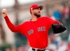 Boston Red Sox starting pitcher Rick Porcello (22) works against the Baltimore Orioles in the first inning of a spring training baseball game Wednesday, March 20, 2019, in Sarasota, Fla. (AP Photo/John Bazemore)