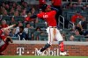 Atlanta Braves Ozzie Albies (1) follows through on a solo home run during the third inning of the team's baseball game against the Washington Nationals on Friday, Sept. 6, 2019, in Atlanta. (AP Photo/John Bazemore)