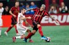 Atlanta United defender Franco Escobar (2) moves the ball as Toronto FC midfielder Nicolas Benezet (7) pulls on his jersey in the first half of their MLS Eastern Conference final soccer match Wednesday, Oct. 30, 2019 in Atlanta. (AP Photo/John Bazemore)