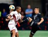 Mexico's Roberto Alvarado (24) and Venezuela's Roberto Rosales (16) vie for the ball in the first half of an international friendly soccer match Wednesday, June 5, 2019, in Atlanta. (AP Photo/John Bazemore)