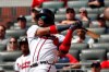 Atlanta Braves center fielder Ronald Acuna Jr. (13) follows through on a solo home run in the third inning of a baseball game against the Philadelphia Phillies Thursday, Sept. 19, 2019, in Atlanta. The homer was Acuna's 40th of the season. (AP Photo/John Bazemore)