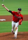 Atlanta Braves starting pitcher Kevin Gausman works against the Miami Marlins during the sixth inning of a baseball game Friday, April 5, 2019, in Atlanta. (AP Photo/John Bazemore)