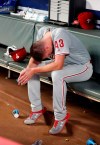 Philadelphia Phillies starting pitcher Nick Pivetta (43) sits on the bench after being relieved in the sixth inning of a baseball game against the Atlanta Braves Wednesday, July 3, 2019, in Atlanta. (AP Photo/John Bazemore)