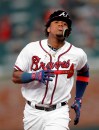 Atlanta Braves' Ronald Acuna Jr. rounds the bases after hitting a solo home run in the third inning of a baseball game against the Chicago Cubs, Monday, April 1, 2019, in Atlanta. (AP Photo/John Bazemore)
