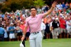 Rory McIlroy waves to the gallery after winning the Tour Championship golf tournament and The FedEx Cup Sunday, Aug. 25, 2019, at East Lake Golf Club in Atlanta. (AP Photo/John Amis)