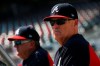Atlanta Braves manager Brian Snitker (43) watches batting practice ahead of Game 1 of a best-of-five National League Division Series between the Atlanta Braves and the St. Louis Cardinals, Thursday, Oct. 3, 2019, in Atlanta. (AP Photo/John Amis)