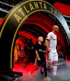 Toronto FC's Michael Bradley walks onto the field with a young fan before the team's MLS soccer match against Atlanta United in Atlanta on Wednesday, May 8, 2019. (AP Photo/Mike Zarrilli)