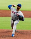 New York Mets Marcus Stroman pitches against the Atlanta Braves during the first inning of a baseball game Thursday, Aug. 15, 2019, in Atlanta. (AP Photo/Tami Chappell)