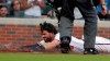 Atlanta Braves Dansby Swanson slides safely into home plate on a hit against the Kansas City Royals during the first inning of a baseball game Tuesday, July 23, 2019, in Atlanta. (AP Photo/Tami Chappell)