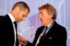 UEFA President Aleksander Ceferin, left, listens to UEFA Executive Committee Member Zbigniew Boniek prior to the start of the 43rd UEFA congress in Rome, Thursday, Feb. 7, 2019. (AP Photo/Gregorio Borgia)