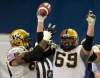 Frank Gunn / THE CANADIAN PRESS Archives
Winnipeg Blue Bombers offensive lineman Glenn January (69) with teammate Ibrahim Khan (left). The bombers have signed January to a contract extension.