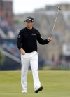 Ireland’s Padraig Harrington reacts after getting a birdie on the 16th green during the third round at the British Open Golf Championship at the Old Course, St. Andrews, Scotland, Sunday, July 19, 2015. (AP Photo/Alastair Grant)