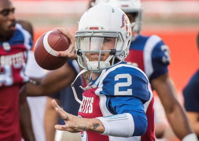 Montreal Alouettes quarterback Johnny Manziel warms up prior the game against the Eskimos. (Graham Hughes / Canadian Press files)