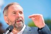 NDP Leader Thomas Mulcair speaks to supporters during a federal election campaign stop in Saint Jerome, Que., on Saturday, August 22, 2015. THE CANADIAN PRESS/Graham Hughes