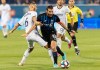 Montreal Impact's Ignacio Piatti, right, challenges Philadelphia Union's Haris Medunjanin during first half MLS soccer action in Montreal, Saturday, July 27, 2019. THE CANADIAN PRESS/Graham Hughes