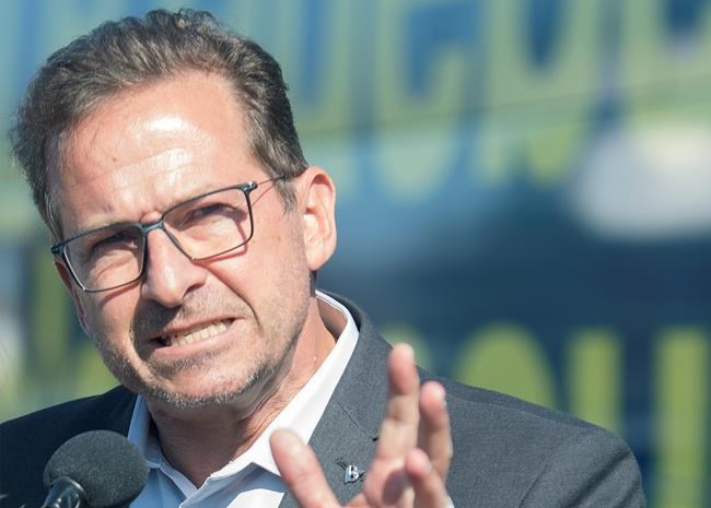 Bloc Quebecois leader Yves-Francois Blanchet speaks to reporters during a federal election campaign stop in Lachute, Que., Friday, October 11, 2019. THE CANADIAN PRESS IMAGES/Graham Hughes