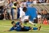 Montreal Impact's Lucas Ontivero, bottom, challenges Sporting Kansas City's Jimmy Medranda during second half MLS soccer action in Montreal, Saturday, June 25, 2016. THE CANADIAN PRESS/Graham Hughes
