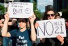 People attend a demonstration to protest against the Quebec government's Bill 21 in Montreal, Monday, June 17, 2019. THE CANADIAN PRESS/Graham Hughes