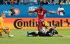 Montreal Impact's Jukka Raitala, right, challenges Toronto FC's Jozy Altidore as Impact's goalkeeper Evan Bush comes out of his box during second half MLS soccer action in Montreal, Saturday, July 13, 2019. THE CANADIAN PRESS/Graham Hughes