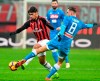 Milan's Lucas Paquet' left, and Napoli's Fabian Ruiz in action during their Italian Serie A soccer match between AC Milan and Napoli, at the San Siro stadium in Milan, Italy, Saturday, Jan. 26, 2019. (AP Photo/Antonio Calanni)